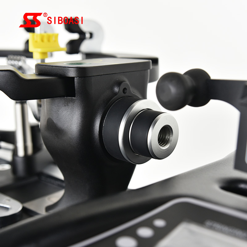 Stringing machine tension head detail